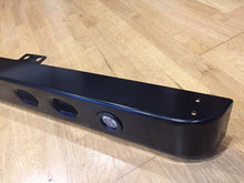 DRL bumper with pressed holes